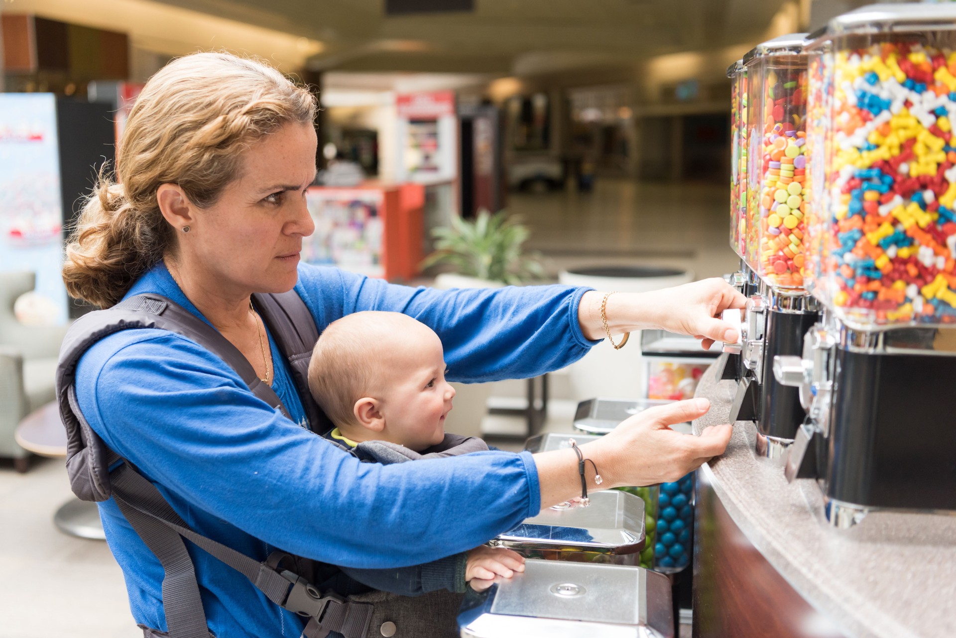shopping for candies using a gumball machine